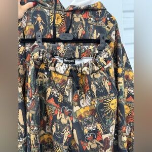 Dolls Kill Patterned Hooded Jumpsuit